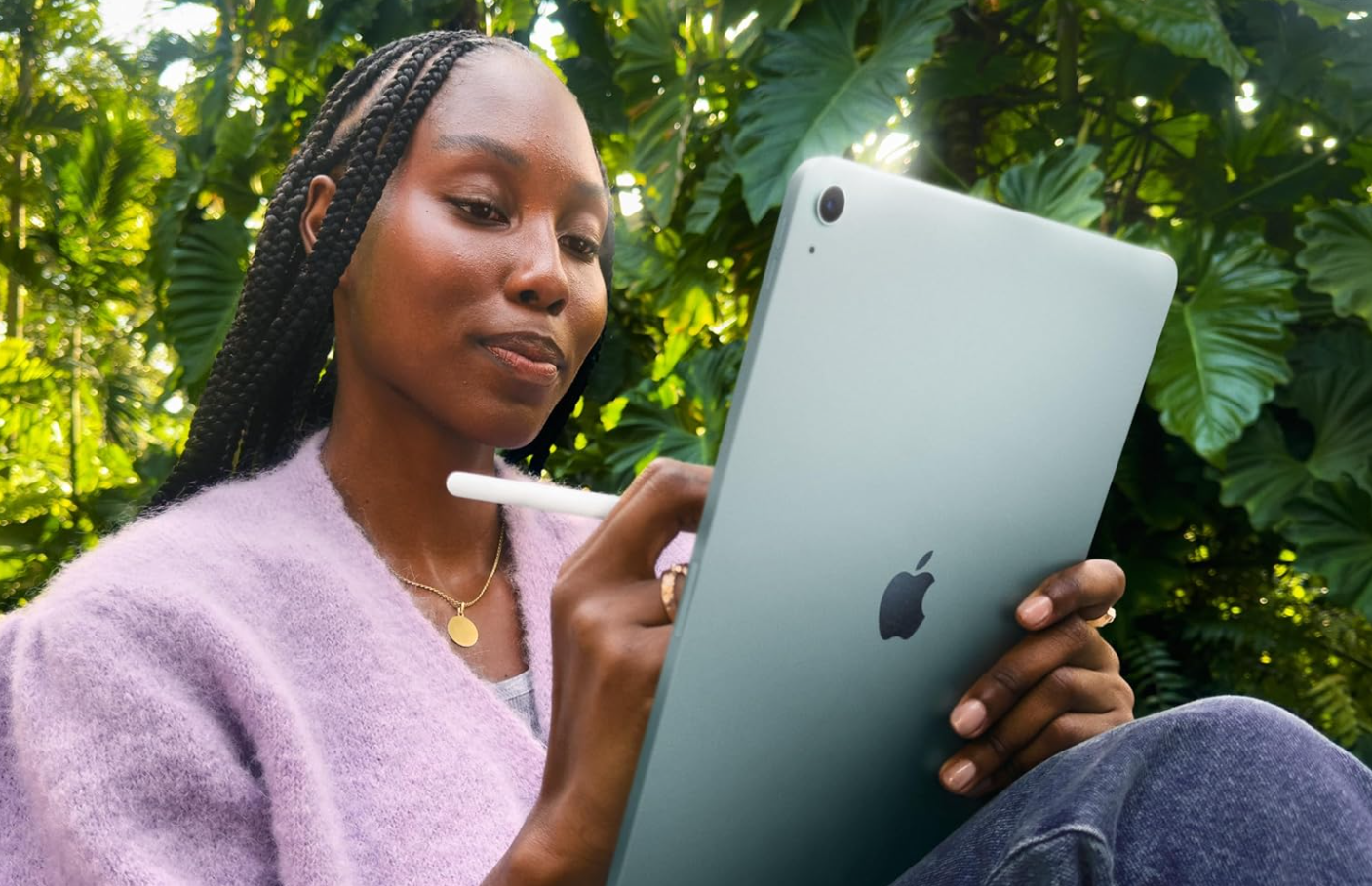 woman holding iPad Air