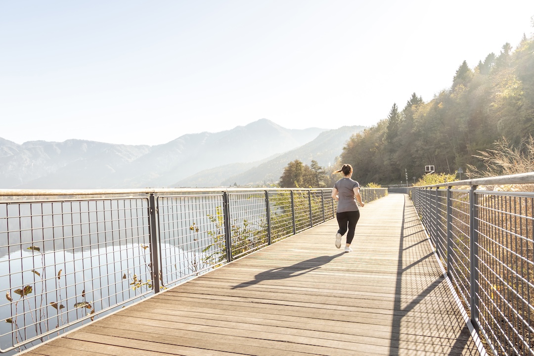 Mid adult woman running