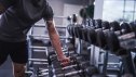 Dumbbell rack with weights in home gym