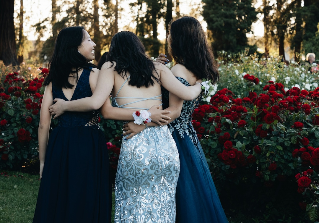 Girls gather in homecoming dresses for a formal event