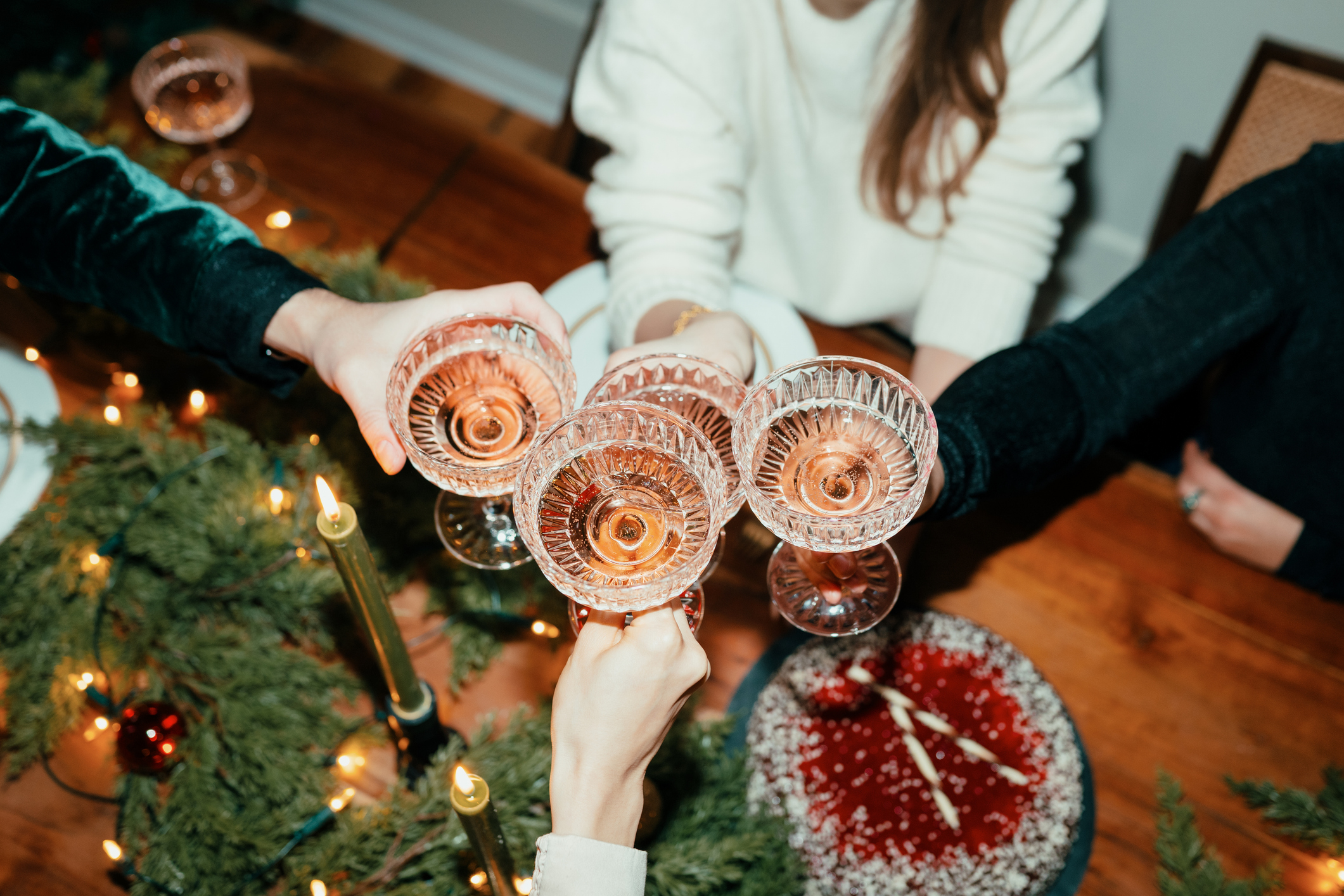 Friends Toasting Around Christmas Table