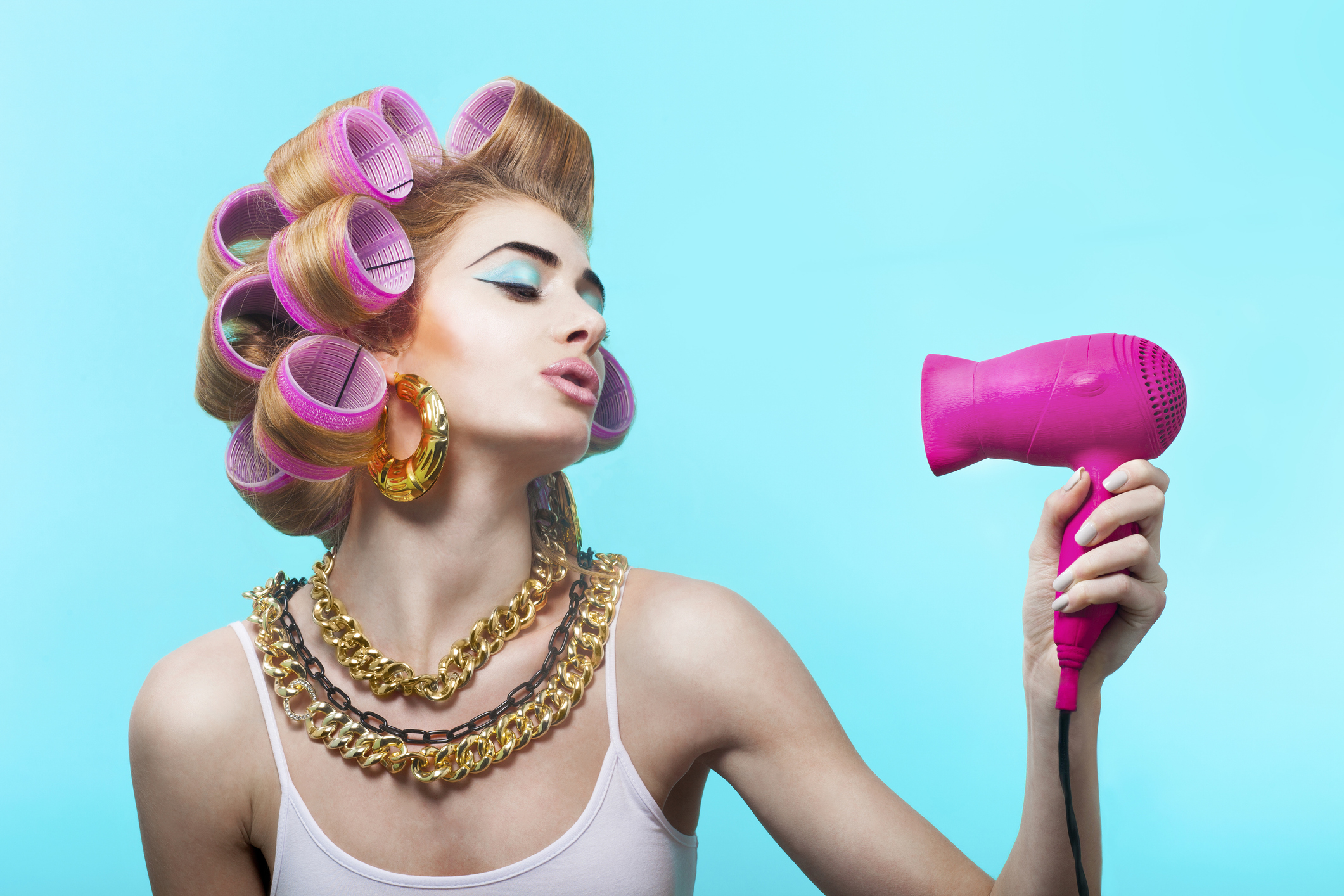 Fashion, design, designer, creative, colorful, trendy, crazy, stylish, radical, amazing, bizarre, on trend, many colors, blue lips, painted, woman, lady, model, serious, portrait, close up, face, makeup, hair drier, blow dry, curlers, studio, funny, humor