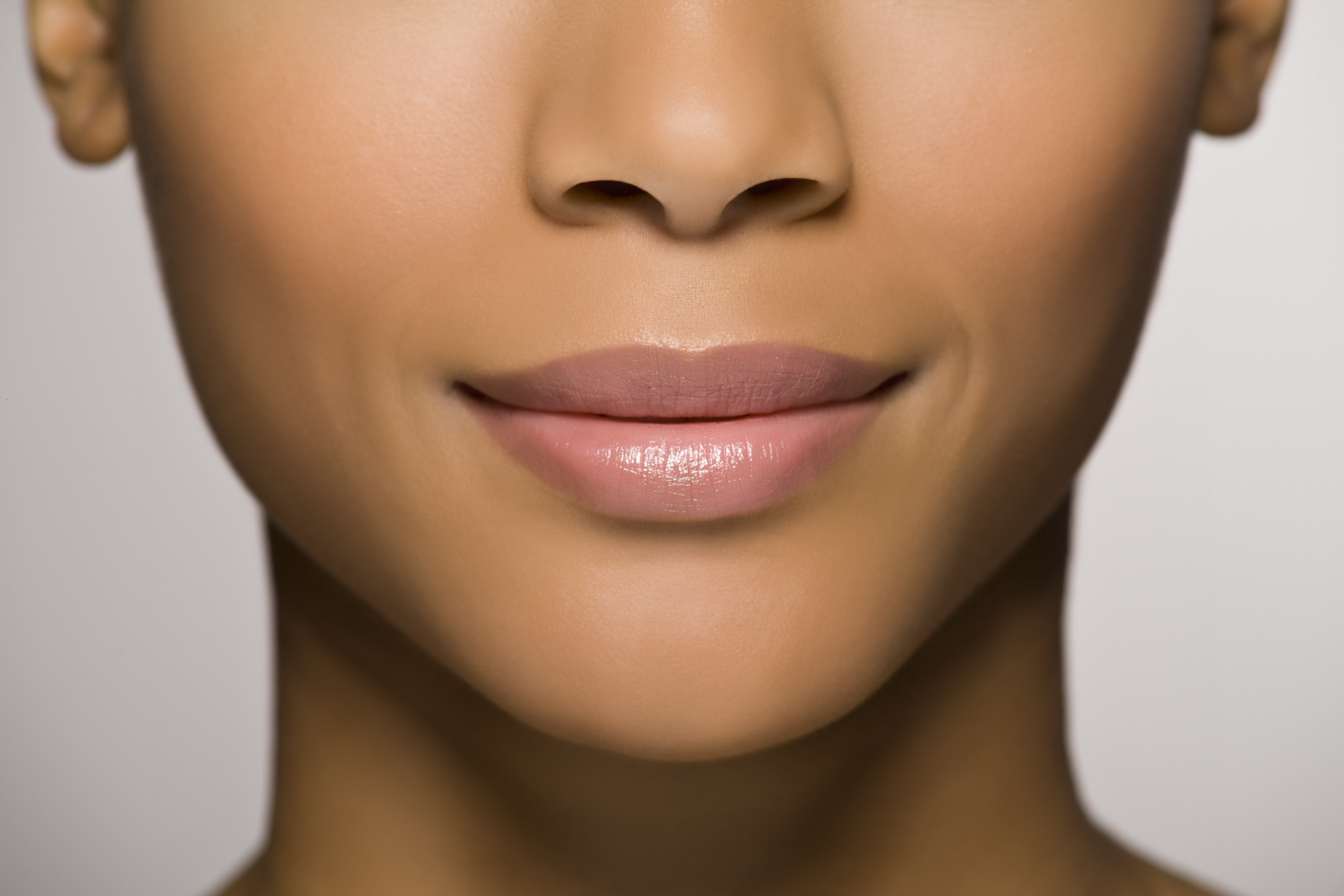 Natural beauty portrait of a young woman shot in warm tones