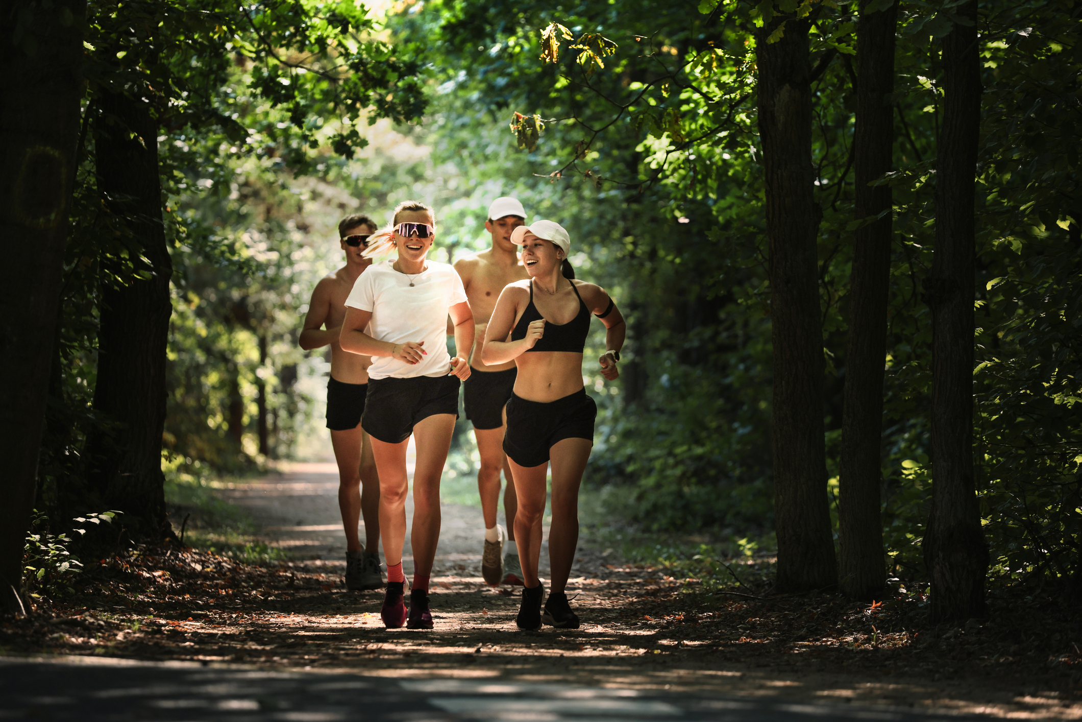 Competitive Pentathletes during their Laser Run team training. Laser Run is one of 5 sports disciplines of the Modern Pentathlon (Fencing, Swimming, Running, Shooting, Obstacle Racing). Part of a series, athletes shown training for each sport.