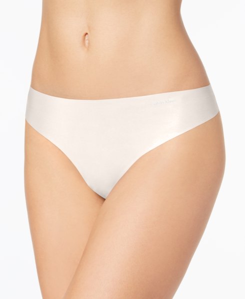 Calvin Klein Womens Invisibles Thong Underwear D3428 Nymphs Thigh
