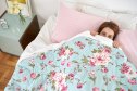 up view of a woman playing hide under the sheets