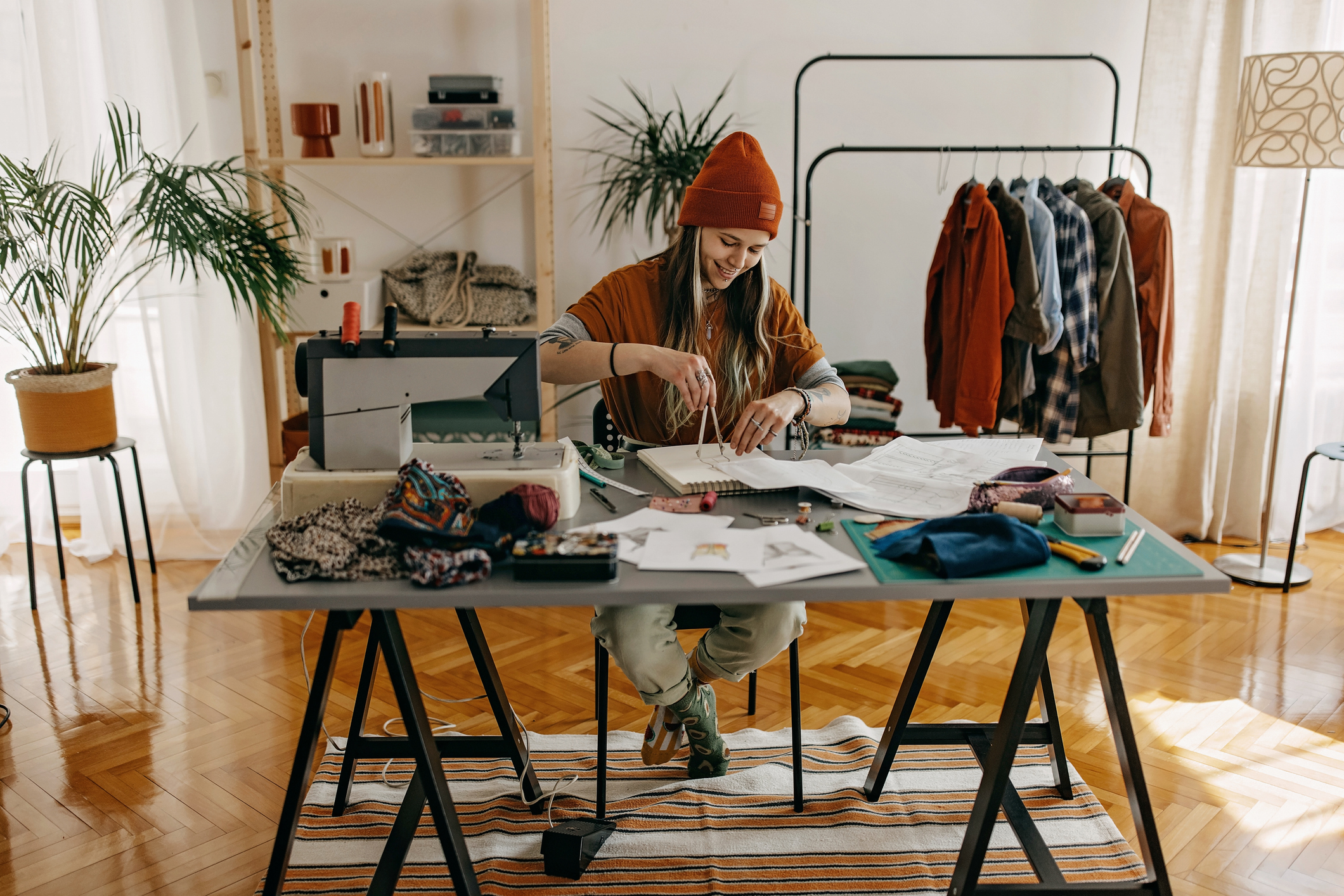 Young woman drawing sketch for new design