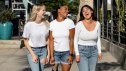 women wearing jeans and white shirts