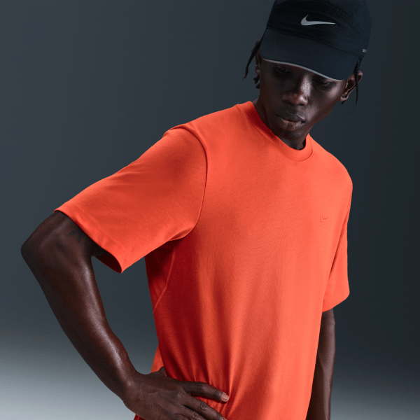 Nike Mens Primary Dri-FIT Short-Sleeve Versatile Top in Red | DV9831-633